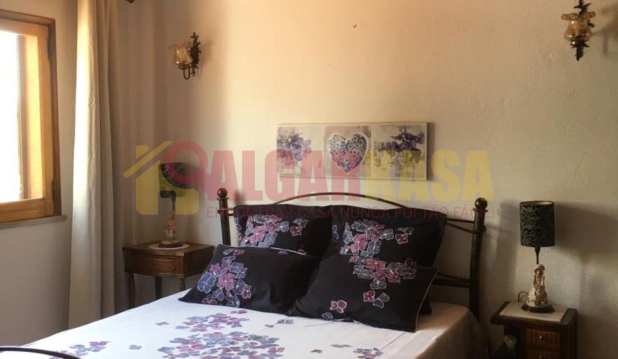 Quarto cama casal cima